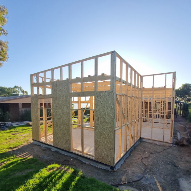 Custom build home in early stages with wooden structure