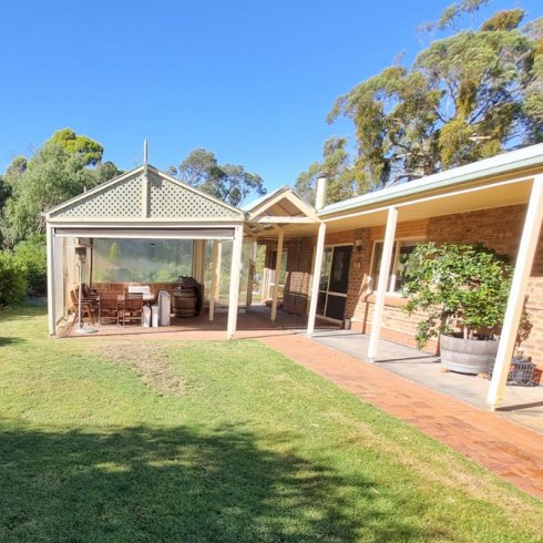 Outside pergola area of home