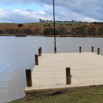 Decking area overlooking large waterfront